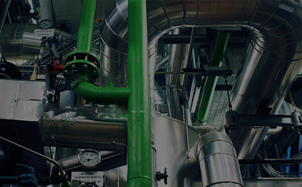 Why do steam pipes often have a bend in them?